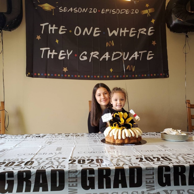 Robert Fernandez's 5-year-old daughter Roxanne and 14-year-old daughter Samantha in California.