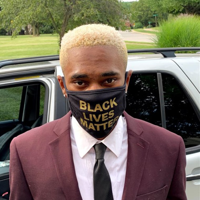 Dean Holmes wears a face mask that reads "Black Lives Matter" to his graduation ceremony at York Catholic High School on June 28, 2020.