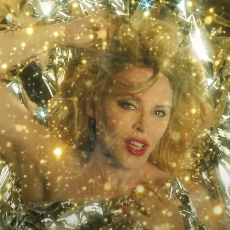 Kylie Minogue dazzles in "Say Something."