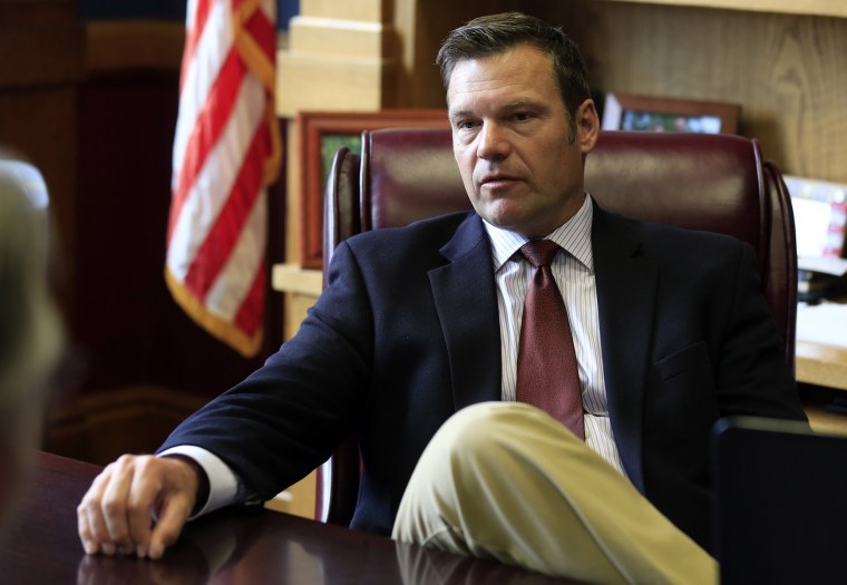 Kansas Secretary of State Kris Kobach talks with a reporter in his office in Topeka, Kan., on May 17, 2017.