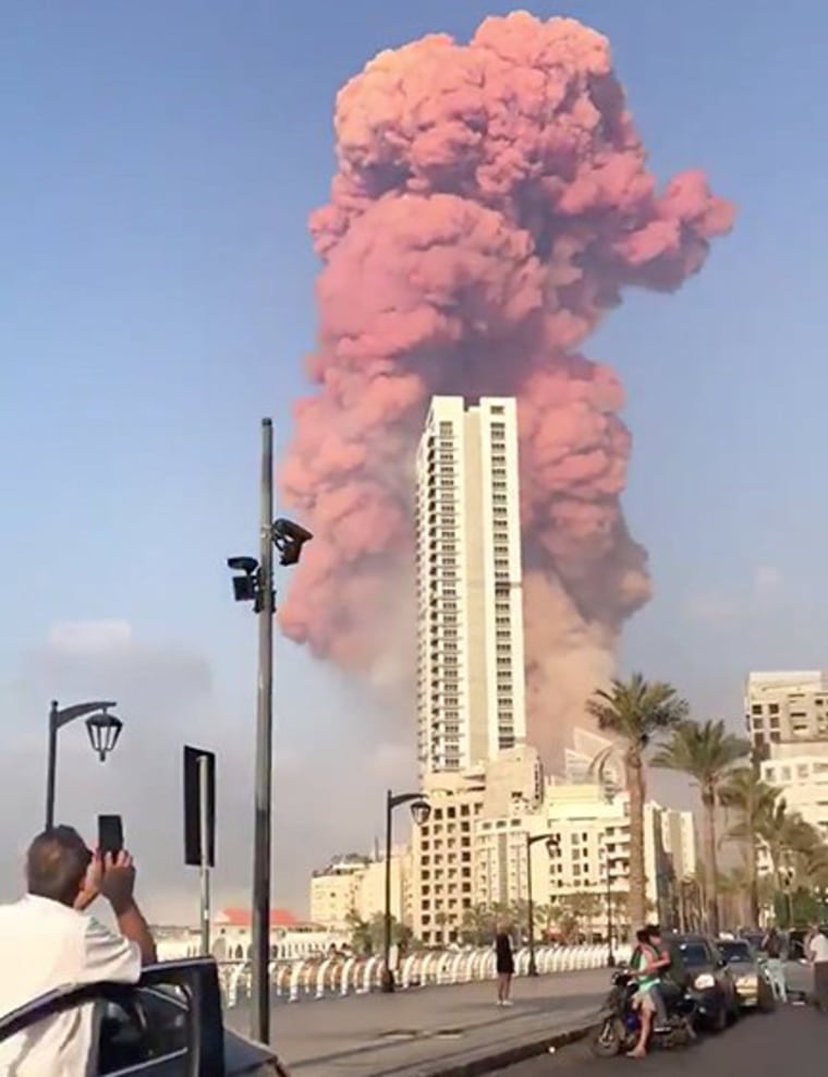 Image: Smoke rises after an explosion in Beirut