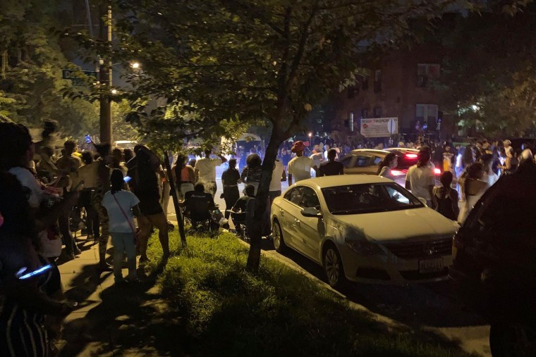 This image provided by a resident in Washington, D.C., neighborhood shows a party where a shooting later occurred.