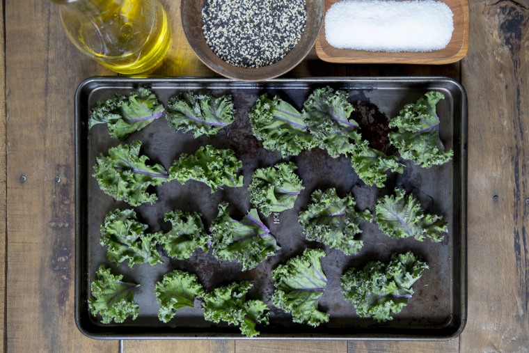 Skip the bagged snacks and whip up a batch of these crunchy, salty kale chips instead. 