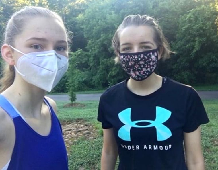 Two sisters competed in the #maskedmile challenge - and clocked in at a seven-minute mile.