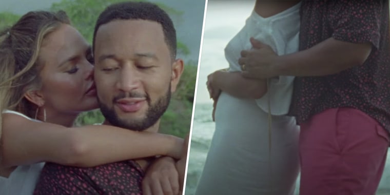 The couple revealed Teigen's baby bump in a music video.