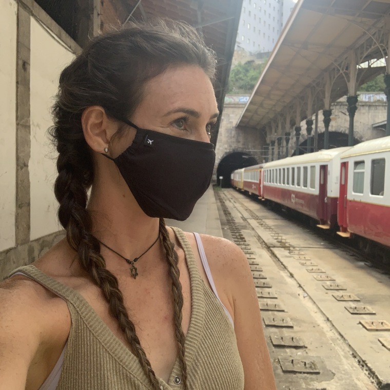 wearing the NxTSTOP bamboo silver ion mask in the train station in Porto