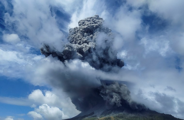 Image: Mount Sinabung spews volcanic ash in Karo, North Sumatra province