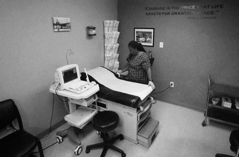 Image: Director of Clinical Services Marva Sadler prepares the operating room at the Whole Woman's Health clinic in Forth Worth, Texas, on Sept. 4, 2019.