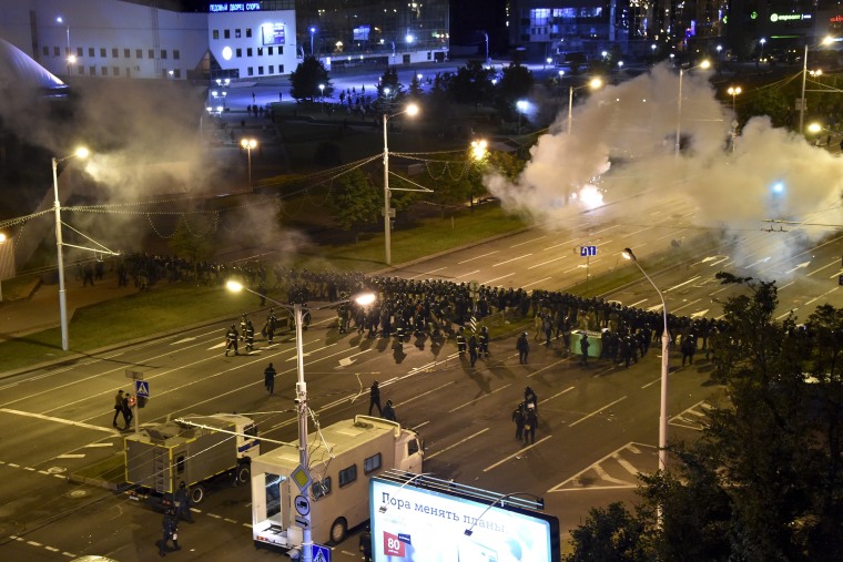 Image: Police block a square during a mass protest following the presidential election in Minsk, Belarus