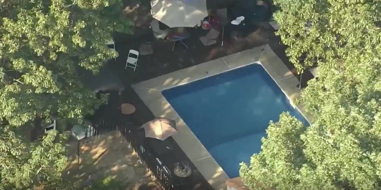 Police say two men held a pool party with around 250 people at a home in Gloucester Township, N.J., and charged an admission fee for it.