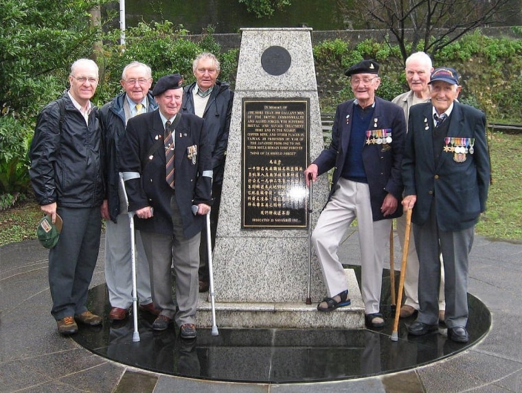 Michael Hurst, far left, with former POWs revisiting the Kinkeseki copper mine camp in Taiwan.