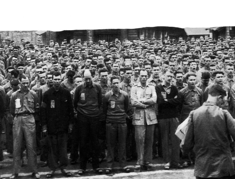 Former POWs at a prayer service at a camp in Taiwan, a publicity stunt, according to Hurst. The POWs were forced to work for long hours and severely punished if they didn't meet quotas.
