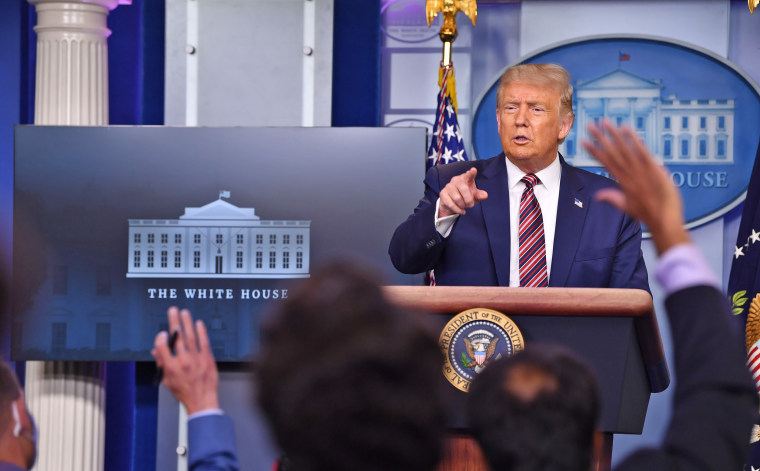 President Donald Trump answers questions at the White House on Aug. 12, 2020.