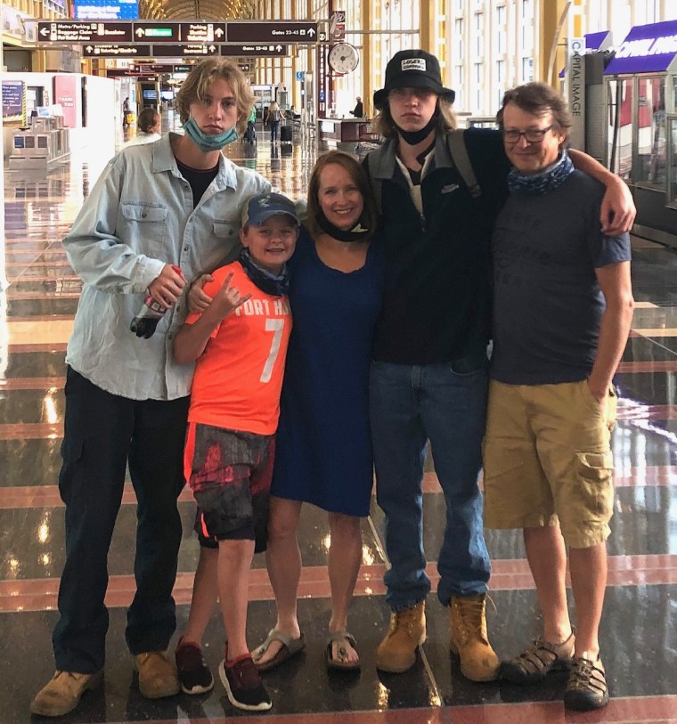 A family photo of the Folsoms at the airport before Josh and Will, 18, left for their gap year with AmeriCorps. From Left to right: Josh Folsom, Anderson Folsom, Jennifer Folsom, Will Folsom, Ben Folsom.