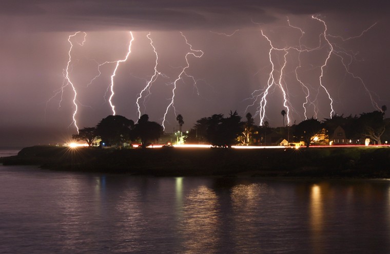 A rare lightning storm crackles over Mitchell's Cove in Santa Cruz, California, around 3 a.m. Sunday.