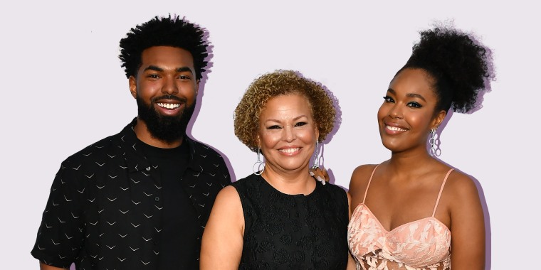 Debra Lee poses with her children, Quinn Coleman and Ava Coleman, at the pre-BET Awards dinner on June 20, 2018, in Los Angeles, California.
