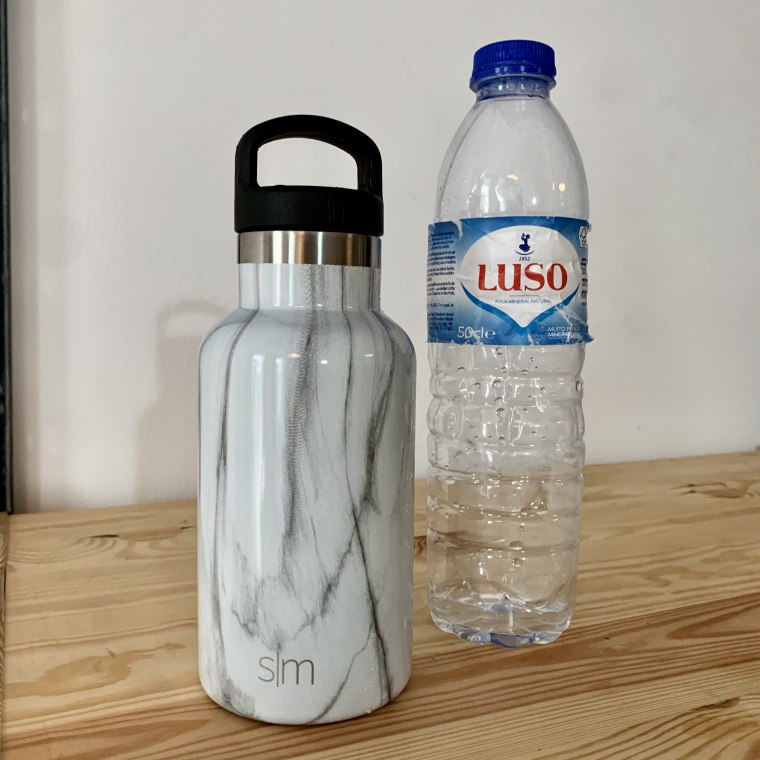 plastic water bottle vs. Simple Modern water bottle