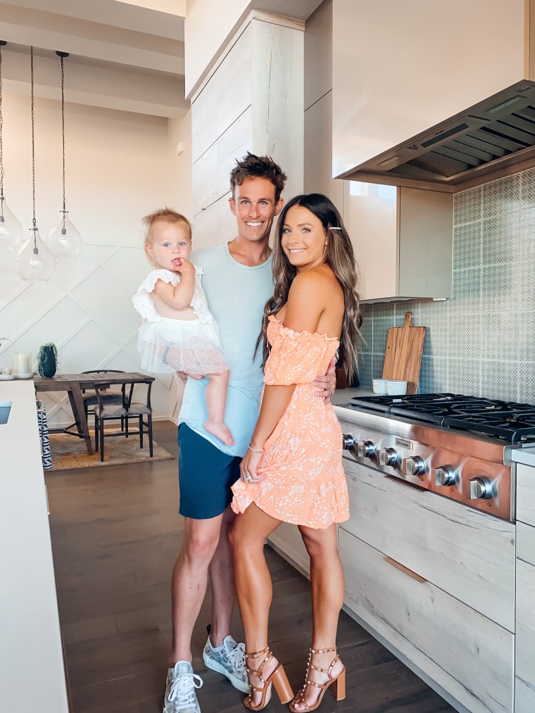 Mackenzie Haggett with her husband, Blake, and their daughter, Aria.