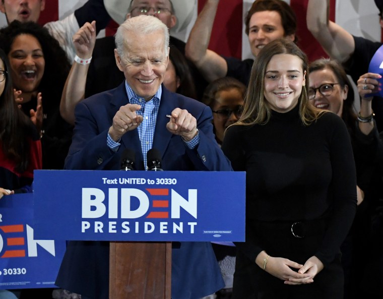 Democratic presidential candidate former Vice President Joe Biden (L) and his granddaughter Finnegan Biden