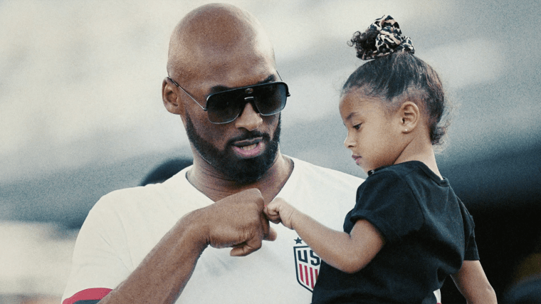 Kobe Bryant and one of his four daughters.