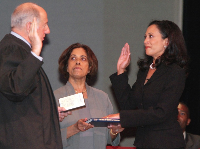 Image: San Francisco's new district attorney, Kamala Harris, right, receives the oath of office