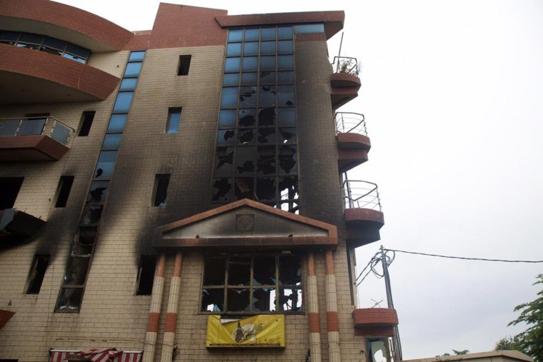 Image: A building owned by the Malian Minister of Justice Kassim Tapo, that has been burned and looted in Bamako, Mali