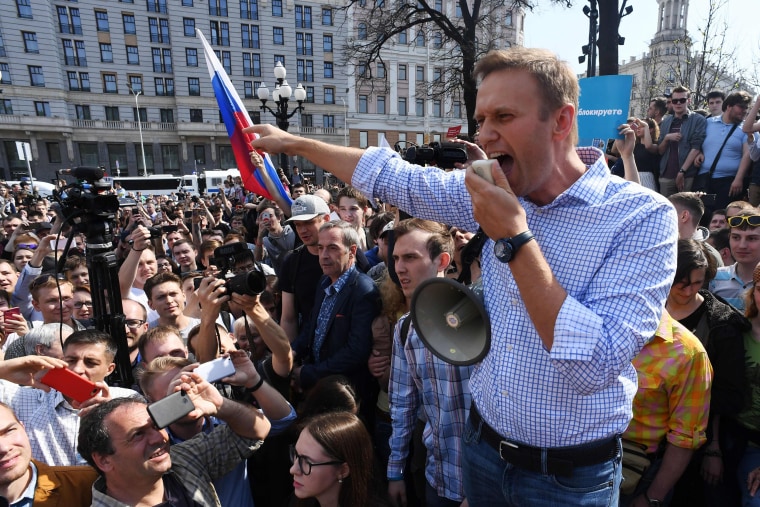 Image: Russian opposition leader Alexei Navalny addresses supporters during an unauthorized anti-Putin rally in Moscow.