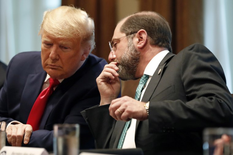 President Donald Trump listens to Health and Human Services Secretary Alex Azar in the Cabinet Room of the White House on March 2, 2020.
