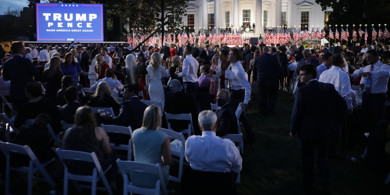 Guests gather to watch President Donald Trump deliver his acceptance speech for the Republican presidential nomination on the South Lawn of the White House on Aug. 27, 2020.