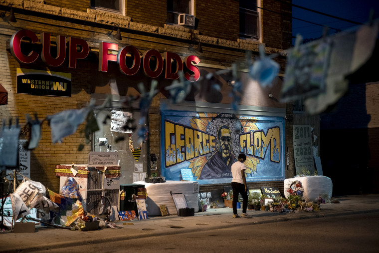 Three months after George Floyd was killed by the police, people visit the memorial set up in his memory in Minneapolis on Aug. 25, 2020.