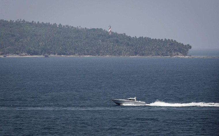 Image: An Indian Navy boat patrols in the waters of the Andaman Sea near Port Blair