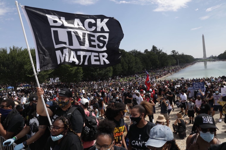 Attendees participate in the March on Washington at the Lincoln Memorial on Aug. 28, 2020 in Washington, DC.