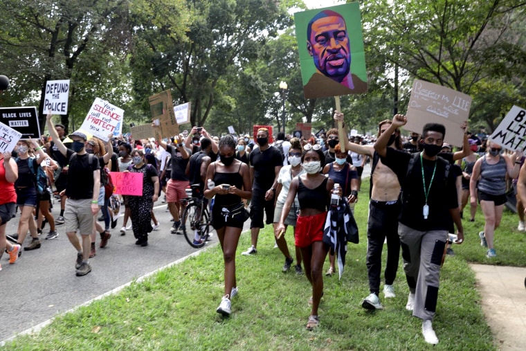 Demonstrators take part in "Get Your Knee Off Our Necks" March on Washington 2020 in support of racial justice on Aug. 28, 2020.