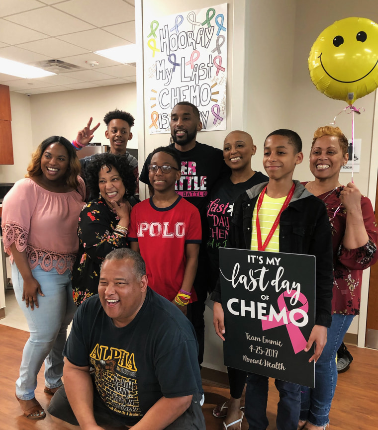 Patricia Edwards, second from left, celebrates her daughter Emily Holloway's final chemotherapy treatment with family, including another daughter, Sherie Gamble, far right.