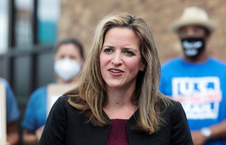 Image: Michigan Secretary of State Jocelyn Benson speaks in support of the United States Postal Service (USPS) outside of a post office in Detroit