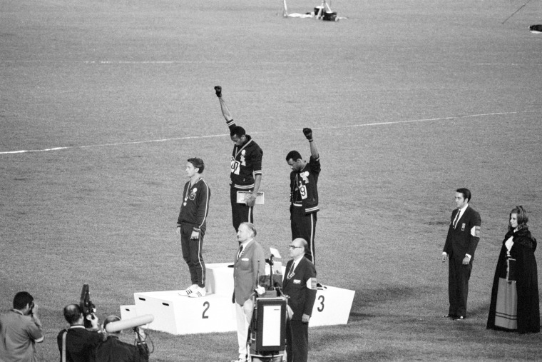 Image: Tommie Smith, John Carlos, Olympic Medalists Giving Black Power Sign