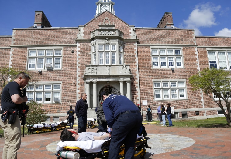 Image: Law enforcement officers and first responders participate in a regional active shooter training at Deering High School in Portland, Maine, on May 18, 2019.