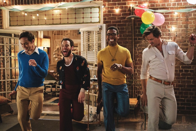 Jim Parsons as Michael, Robin De Jesus as Emory, Michael Benjamin Washington as Bernard and Andrew Rannells as Larry in a scene from the Netflix film "The Boys in the Band."