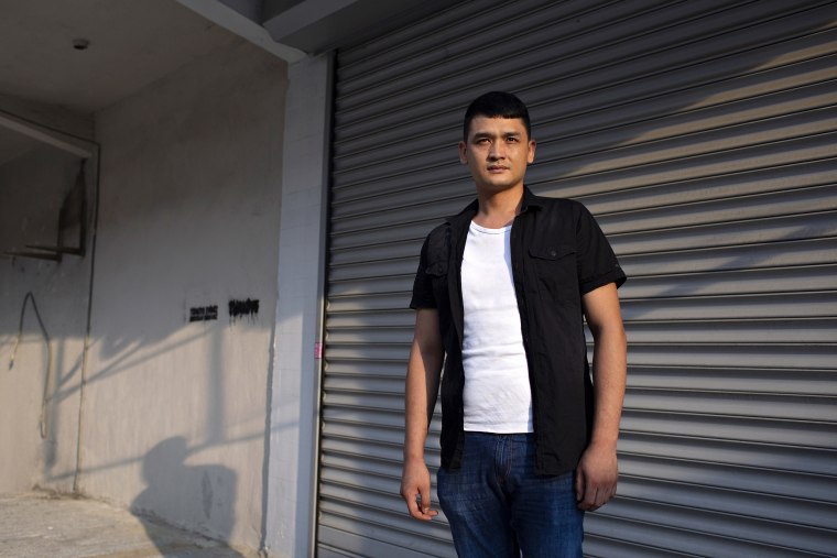 Image: Mammattursun Omer, 29, a former Uighur detainee, in Istanbul, Turkey, where he lives in self-imposed exile after being held and tortured in government custody inside China's Xinjiang region.