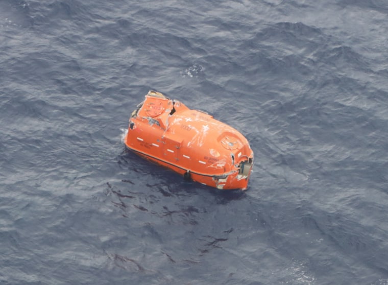 Image: An aerial view taken from an airplane of Japan Coast Guard shows a lifeboat believed to be belonging to the Gulf Livestock 1 in the East China Sea