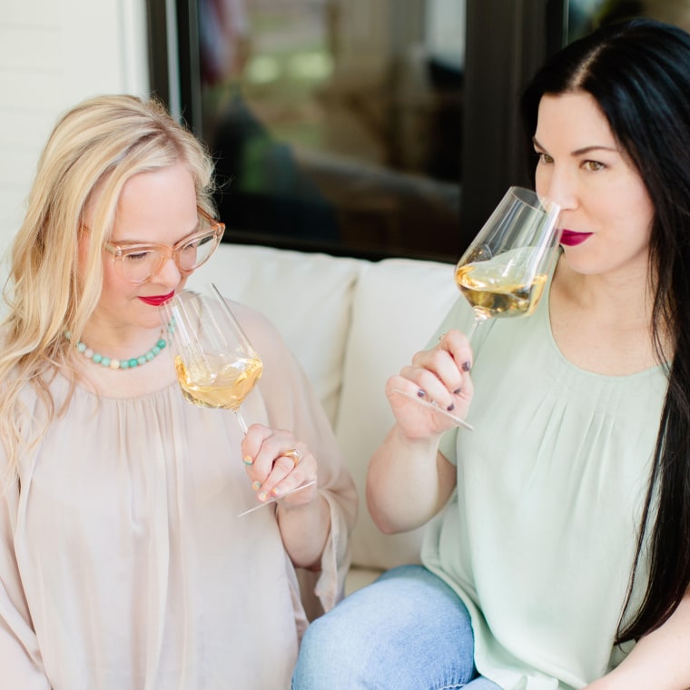 Courtney Dunlop (right) went from magazine beauty editor to owner of a wine company (pictured here with her business partner, Michelle).
