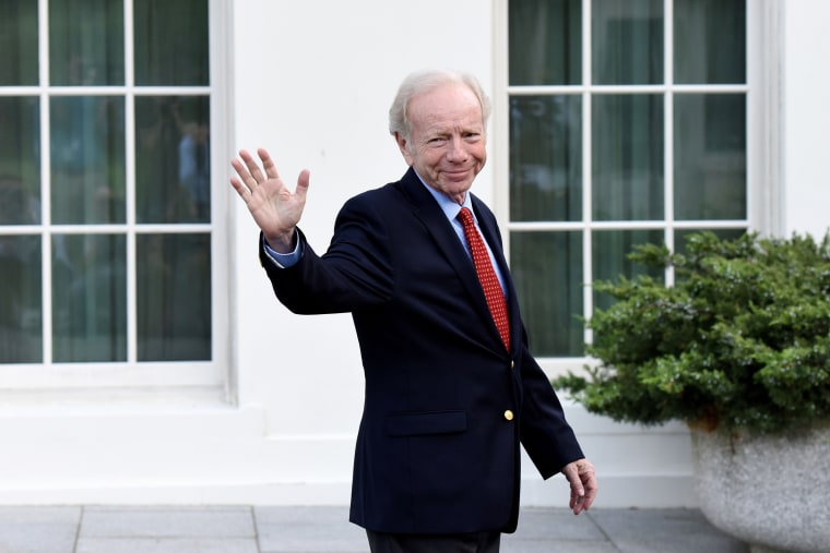 Image: Former Sen. Joe Lieberman leaves the West Wing of the White House