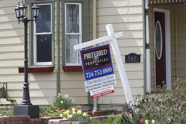Image: A real estate company sign that marks a home for sale in Harmony, Pa.