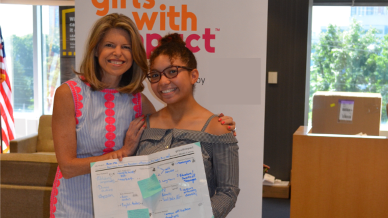 Girls With Impact CEO Jennifer Openshaw with Kristen St. Louis, who graduated from the program.
