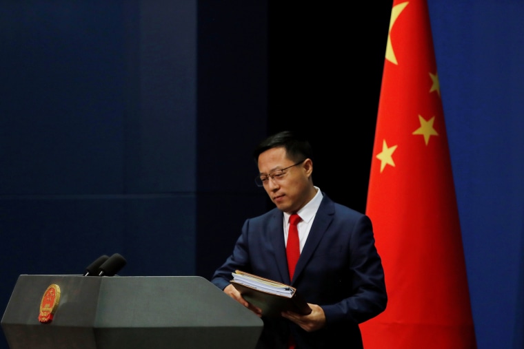 Image: Chinese Foreign Ministry spokesman Zhao Lijian attends a news conference in Beijing, China
