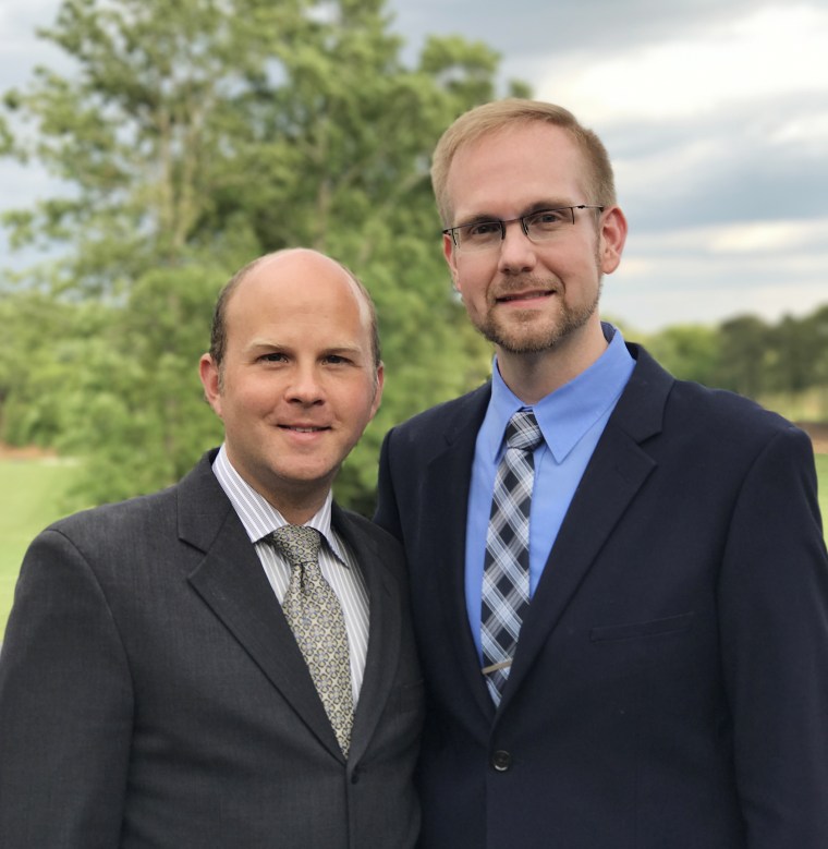 Image: Joshua Payne-Elliott, right, with his husband Layton Payne-Elliott