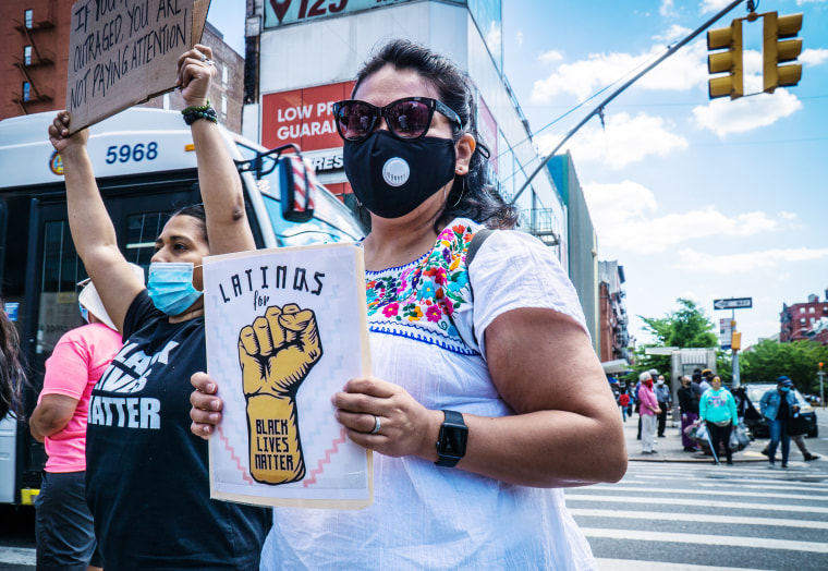 Members of the Latino community at a Black Lives Matter protest in New York City on June 14, 2020.