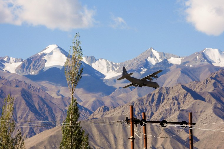 Image: An Indian Air Force Hercules military transport plane prepares to land at an airbase in Leh, the joint capital of the union territory of Ladakh bordering China