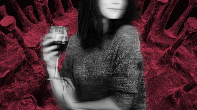 Image: A woman, semi-blurry, drinking red wine as a giant coronavirus spore looms in the background.