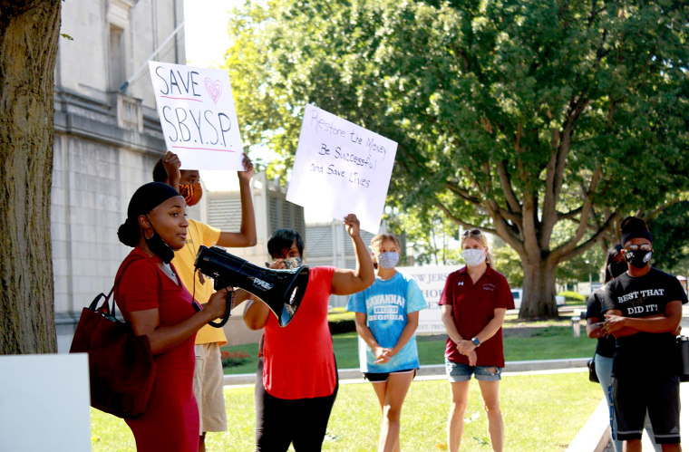The Trenton Student Voice Power Movement organized a rally outside the State House in Trenton, N.J., against cutting school-based youth service programs on Sept. 4, 2020.